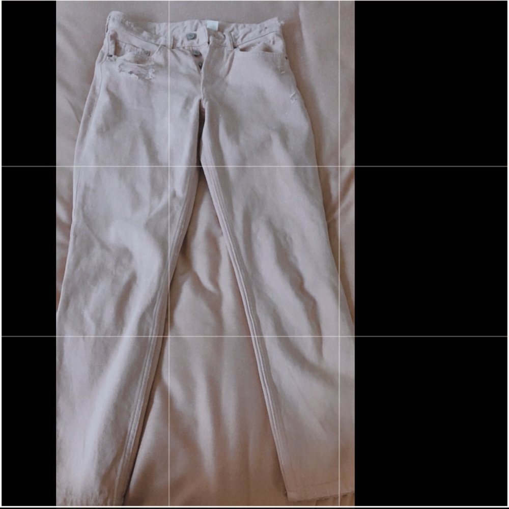 Light pink jeans some rips are real some fake
